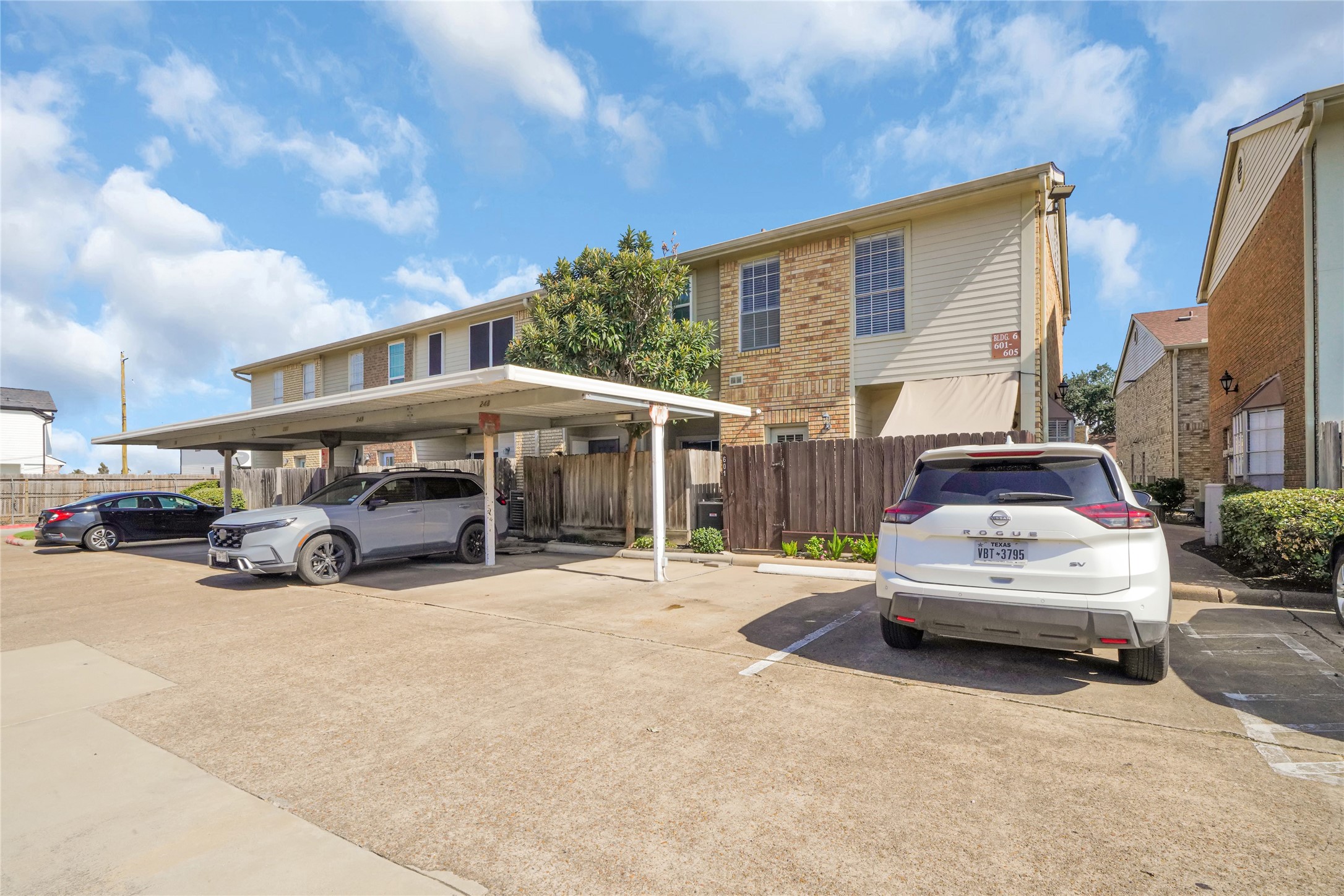 3600 Jeanetta Street, Unit 601 Houston, TX 77063 - Photo 23 of 24 a car parked in front of a building