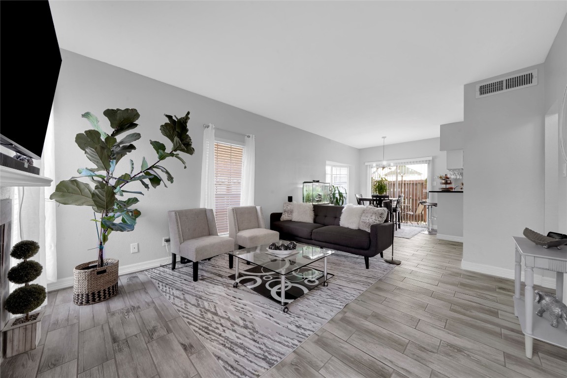 3600 Jeanetta Street, Unit 601 Houston, TX 77063 - Photo 9 of 24 a living room with furniture and a flat screen tv