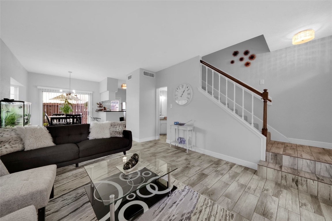 3600 Jeanetta Street, Unit 601 Houston, TX 77063 - Photo 10 of 24 a living room with furniture and wooden floor