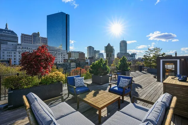 a view of a terrace with furniture