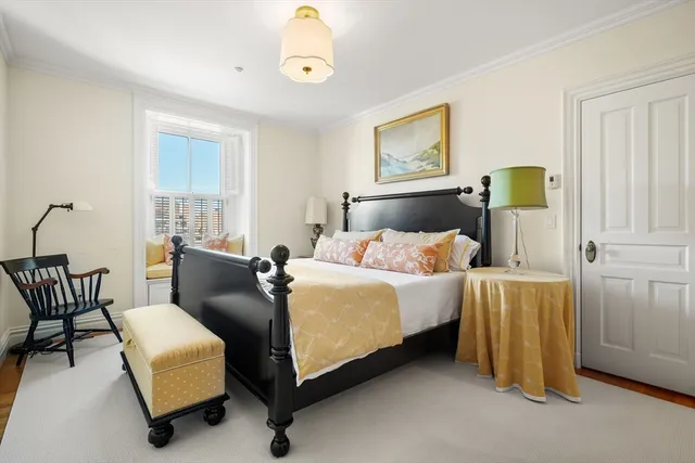 a bed room with a bed and a couch