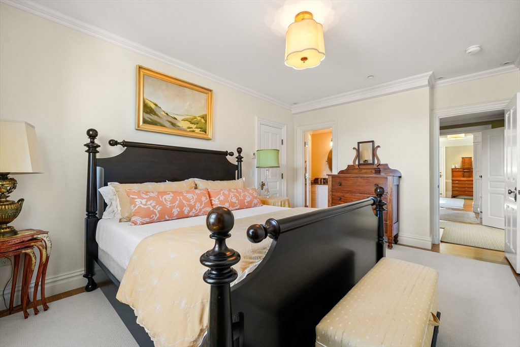 45-47 Commonwealth Avenue, Unit 5 Boston, MA 02116 - Photo 17 of 19 a living room with furniture and a window