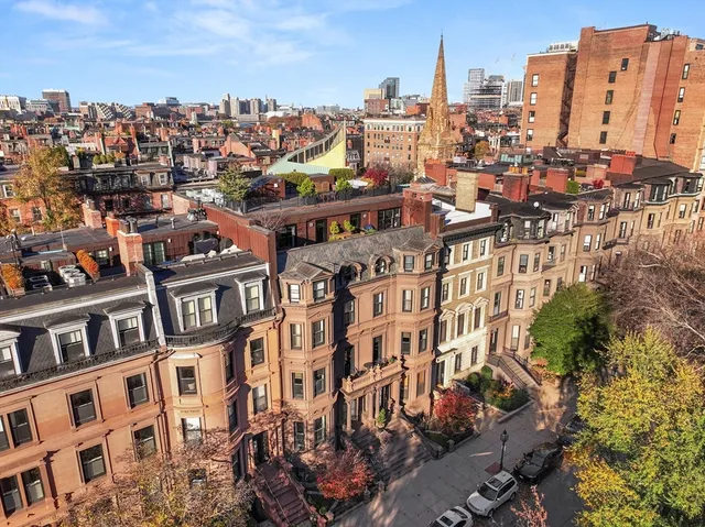 a view of a city with tall buildings