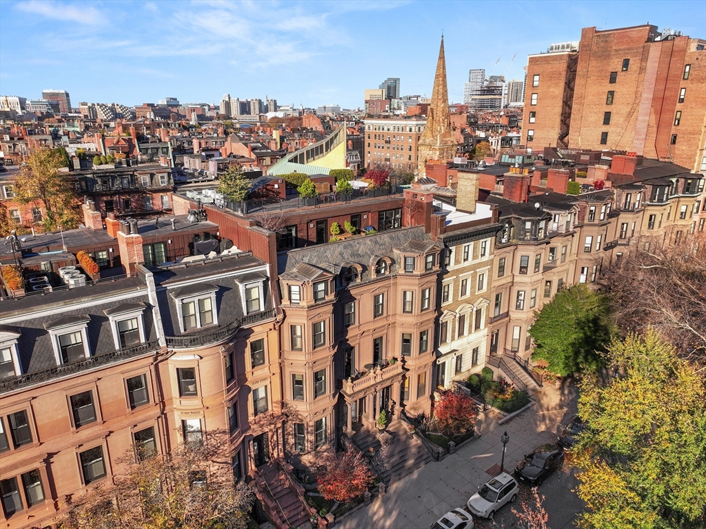 45-47 Commonwealth Avenue, Unit 5 Boston, MA 02116 - Photo 19 of 19 a view of a city with tall buildings