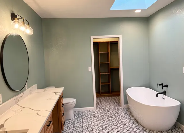 a bathroom with a sink and a bathtub