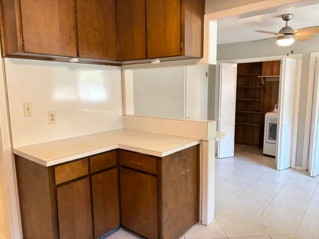 a view of a storage & utility room with washer and dryer