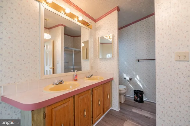 a view of a livingroom with furniture and a window