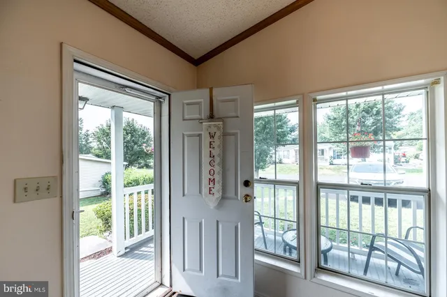 a view of a room that has a large window