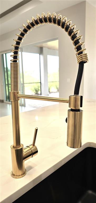 2049 Treasure Lane Punta Gorda, FL 33982 - Photo 16 of 72 a kitchen with a sink and a window