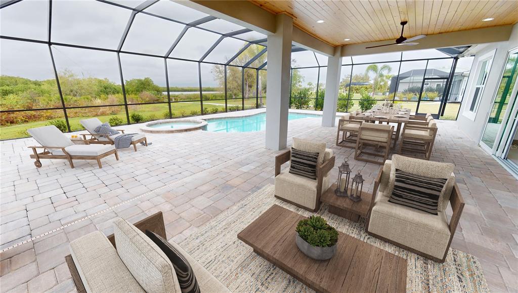 2049 Treasure Lane Punta Gorda, FL 33982 - Photo 48 of 72 a living room with furniture and a floor to ceiling window