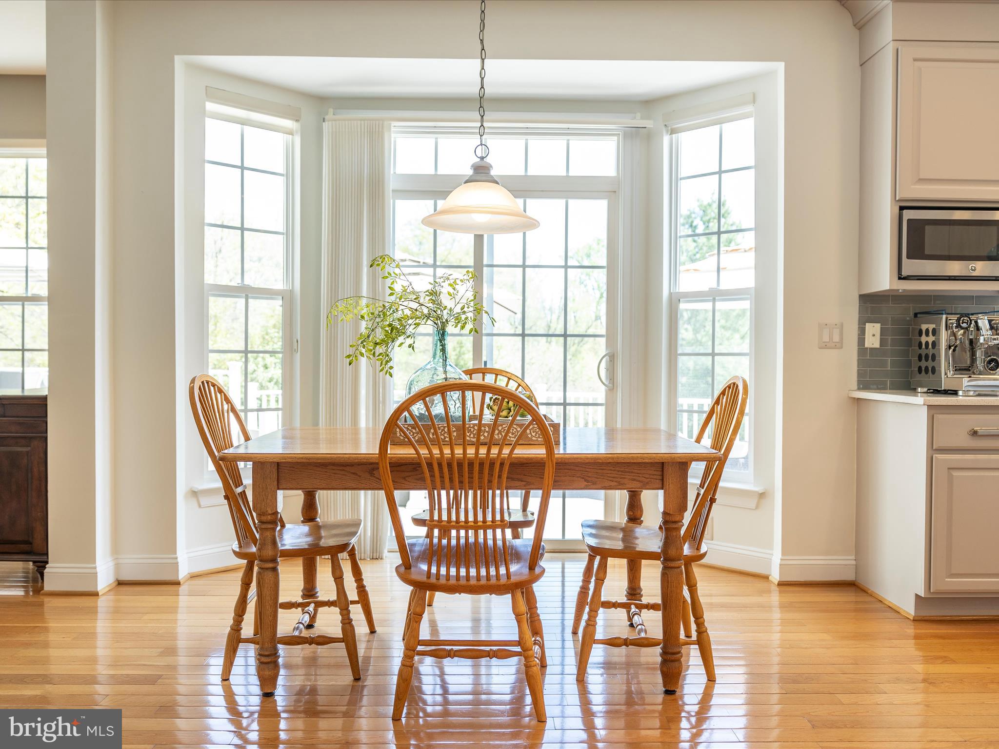 23133 Persimmon Ridge Road Clarksburg, MD 20871 - Photo 21 of 73 Table space in kitchen & sliders to deck.