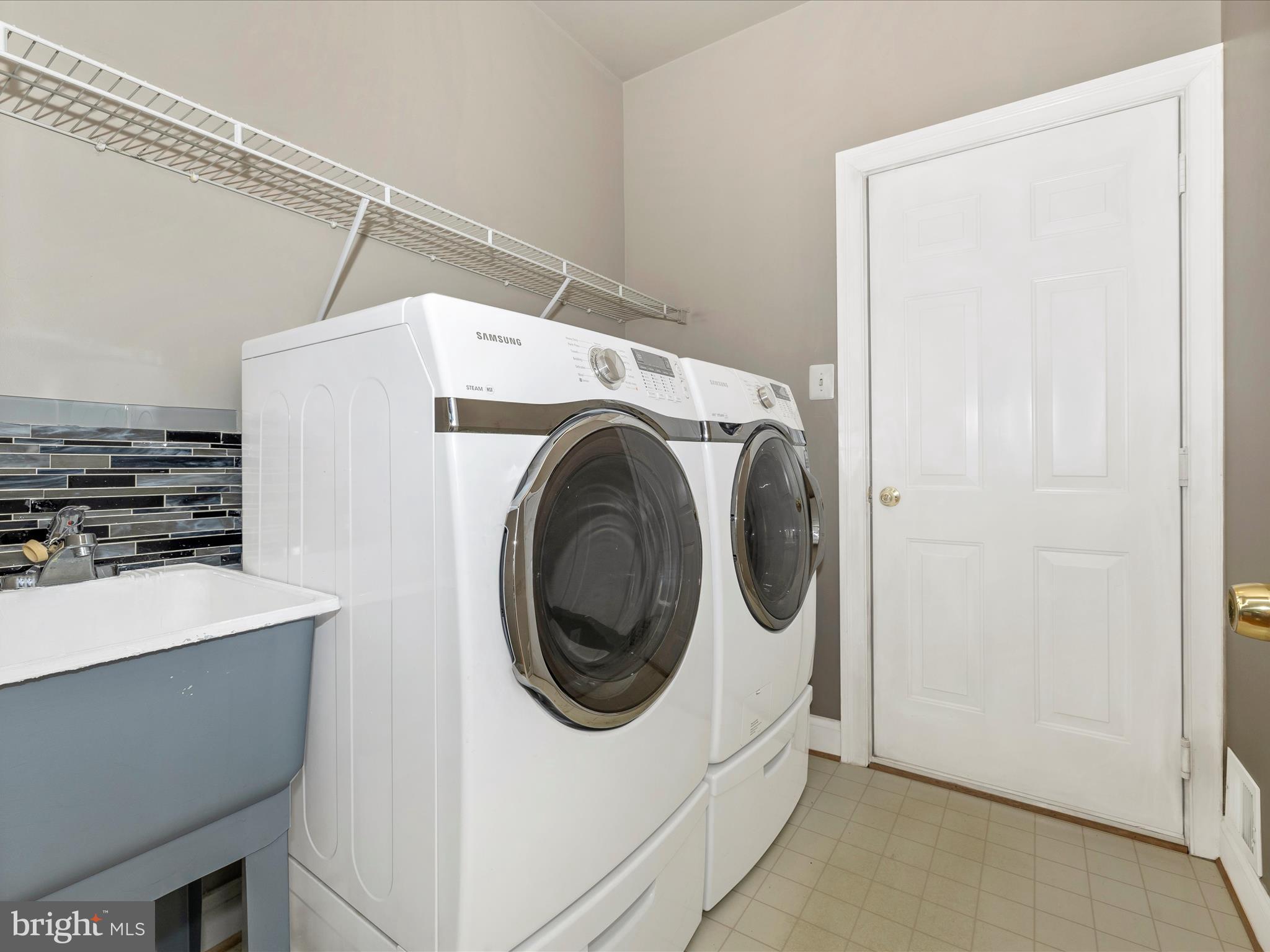 23133 Persimmon Ridge Road Clarksburg, MD 20871 - Photo 30 of 73 Main level laundry with garage access.