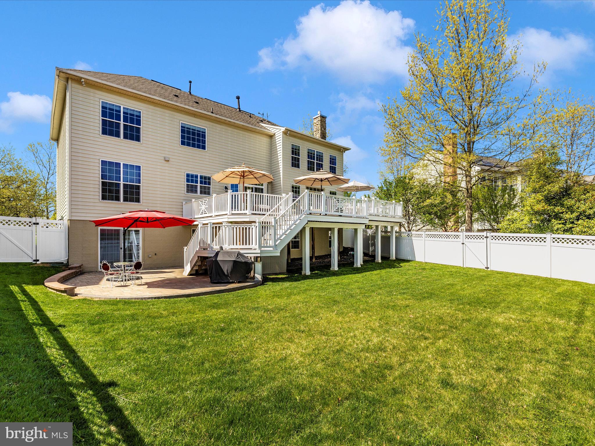 23133 Persimmon Ridge Road Clarksburg, MD 20871 - Photo 61 of 73 Composite deck and stone patio.