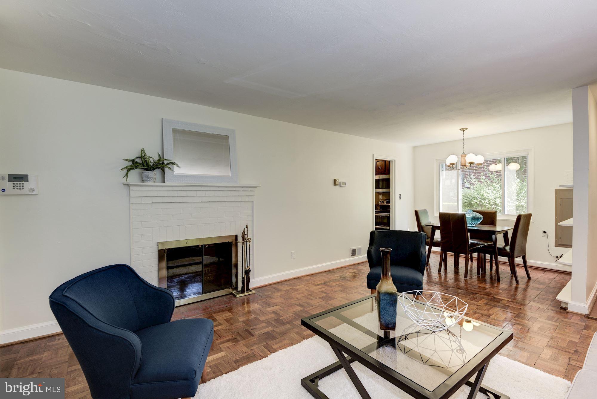 9816 Cottrell Terrace Silver Spring, MD 20903 - Photo 5 of 22 Wood burning fireplace in living room