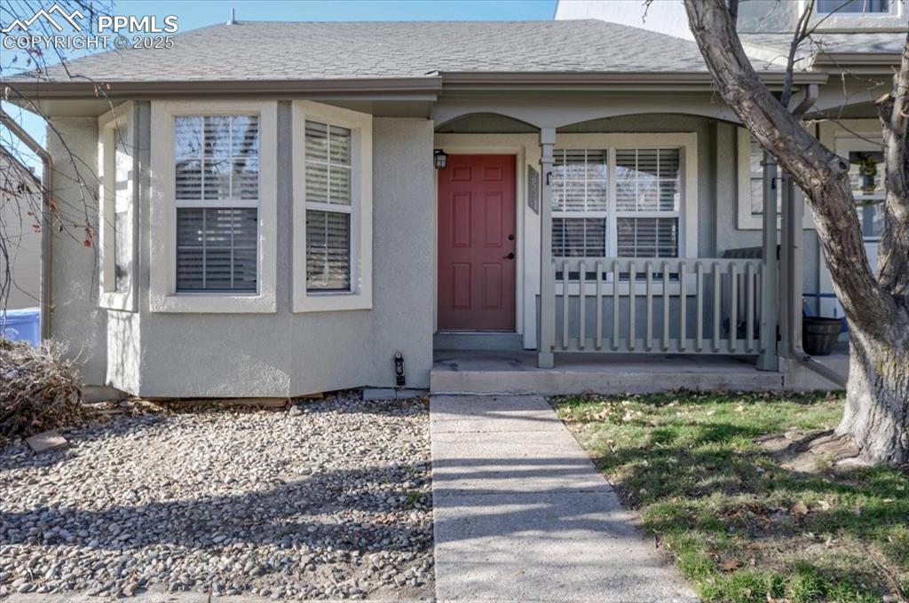 2531 Blazek Loop Colorado Springs, CO 80918 - Photo 1 of 29 a front view of a house