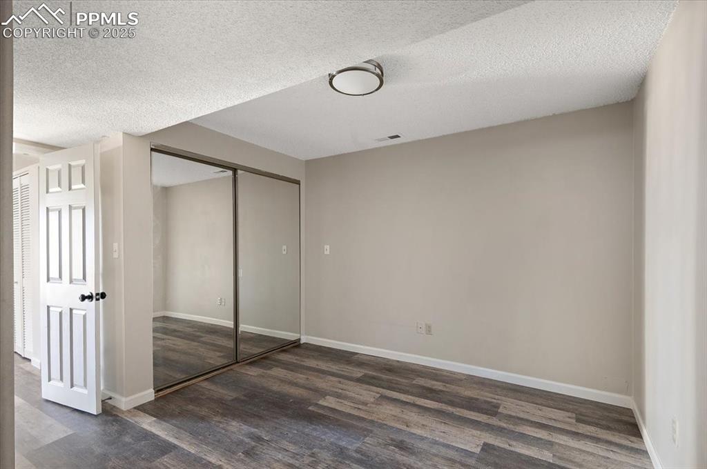 2531 Blazek Loop Colorado Springs, CO 80918 - Photo 16 of 29 an empty room with closet