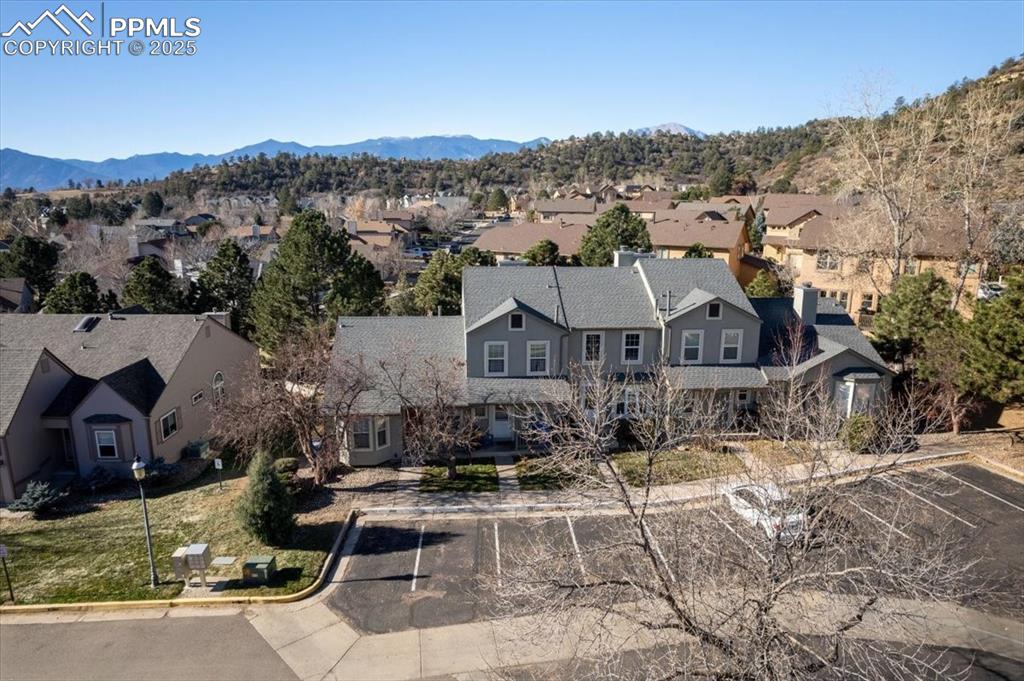 2531 Blazek Loop Colorado Springs, CO 80918 - Photo 23 of 29 an aerial view of a house with a garden
