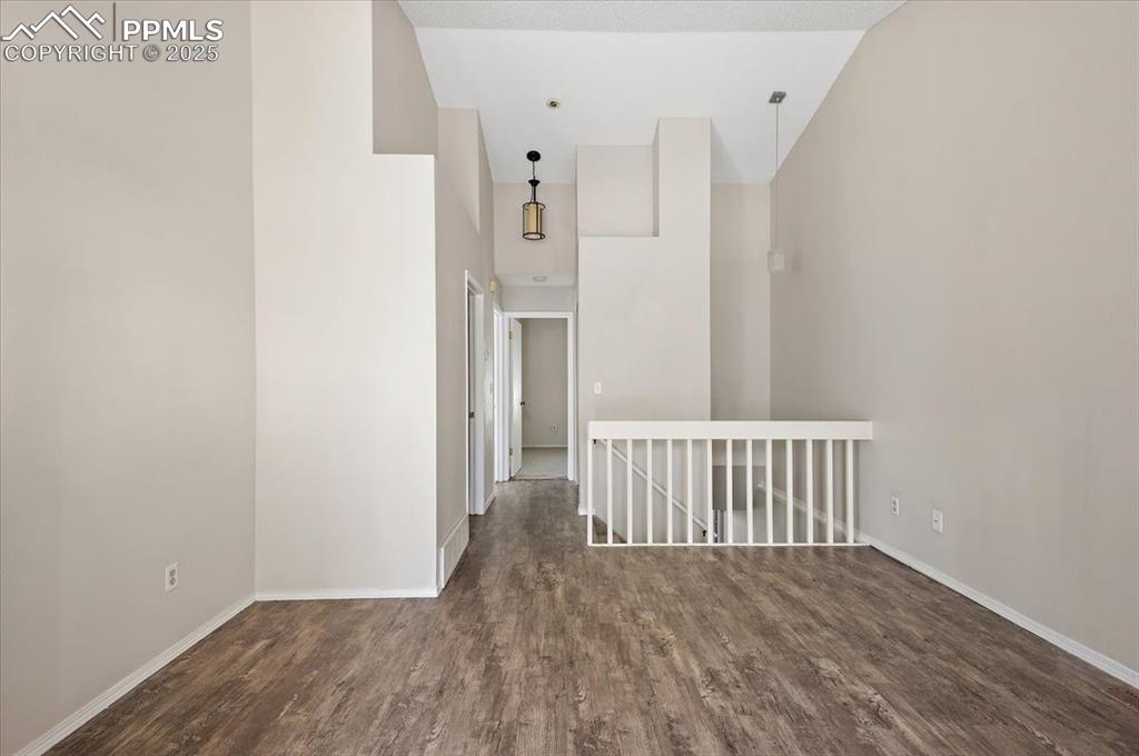 2531 Blazek Loop Colorado Springs, CO 80918 - Photo 5 of 29 a view of hallway with wooden floor