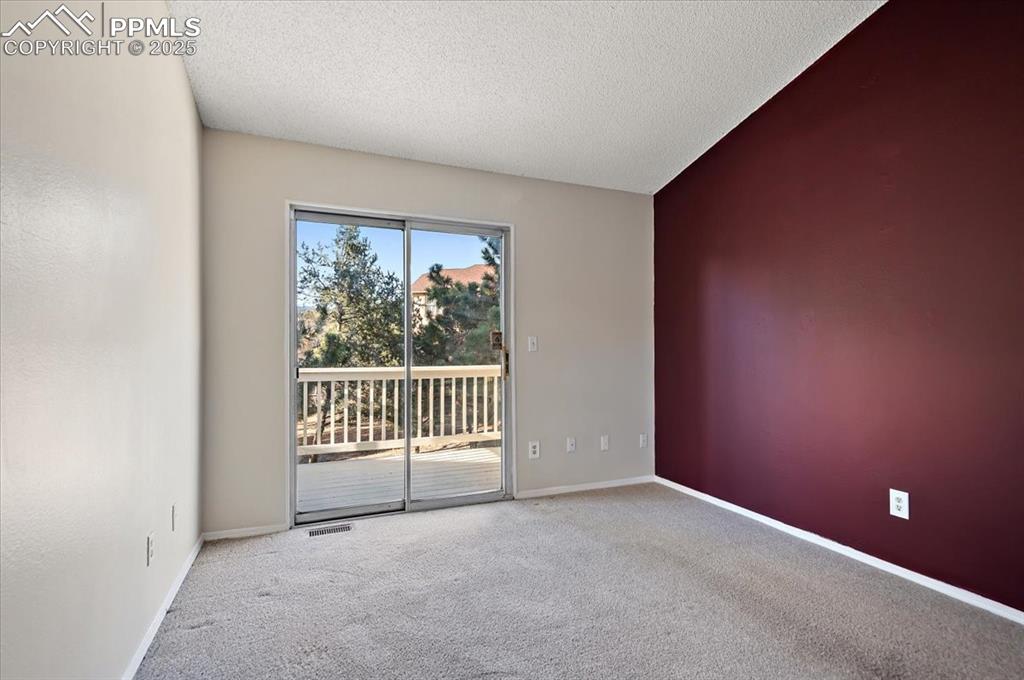 2531 Blazek Loop Colorado Springs, CO 80918 - Photo 9 of 29 a view of a livingroom with entryway