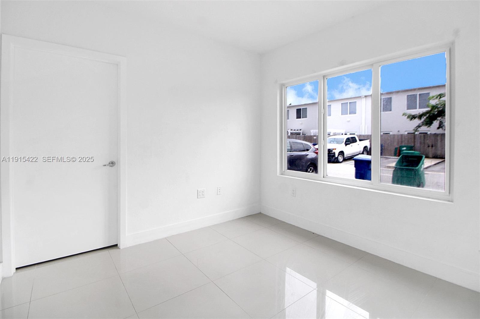 14482 Southwest 259th Street Homestead, FL 33032 - Photo 6 of 35 a view of kitchen and utility room