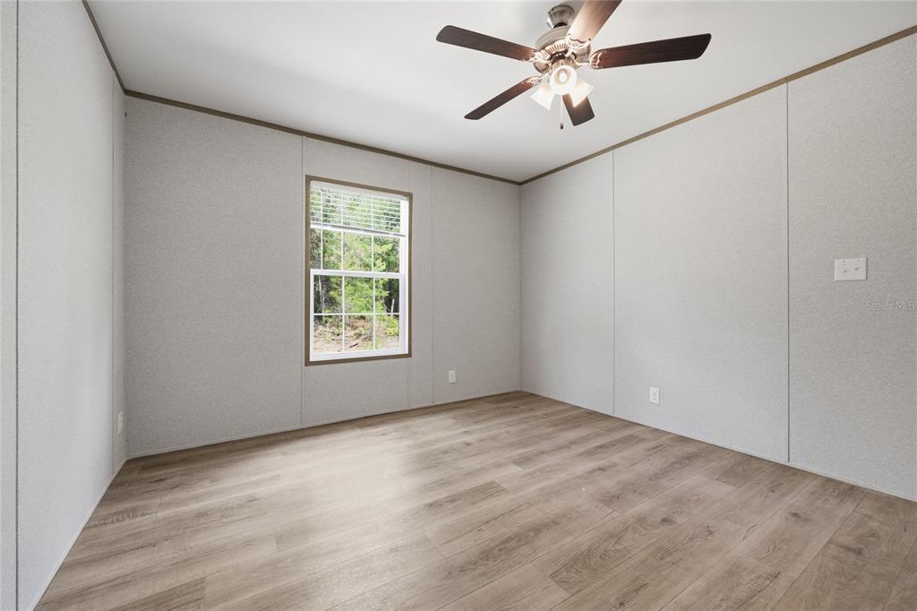 150 19th Street Interlachen, FL 32148 - Photo 23 of 30 a view of an empty room with a window