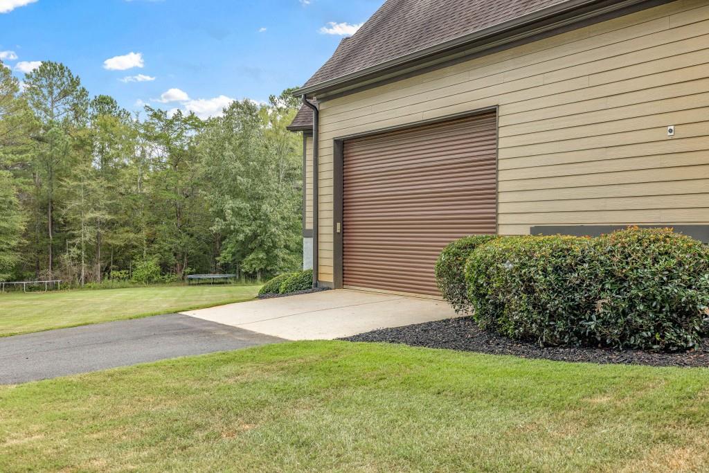 400 Harmony Road Eatonton, GA 31024 - Photo 100 of 136 a view of a backyard of the house