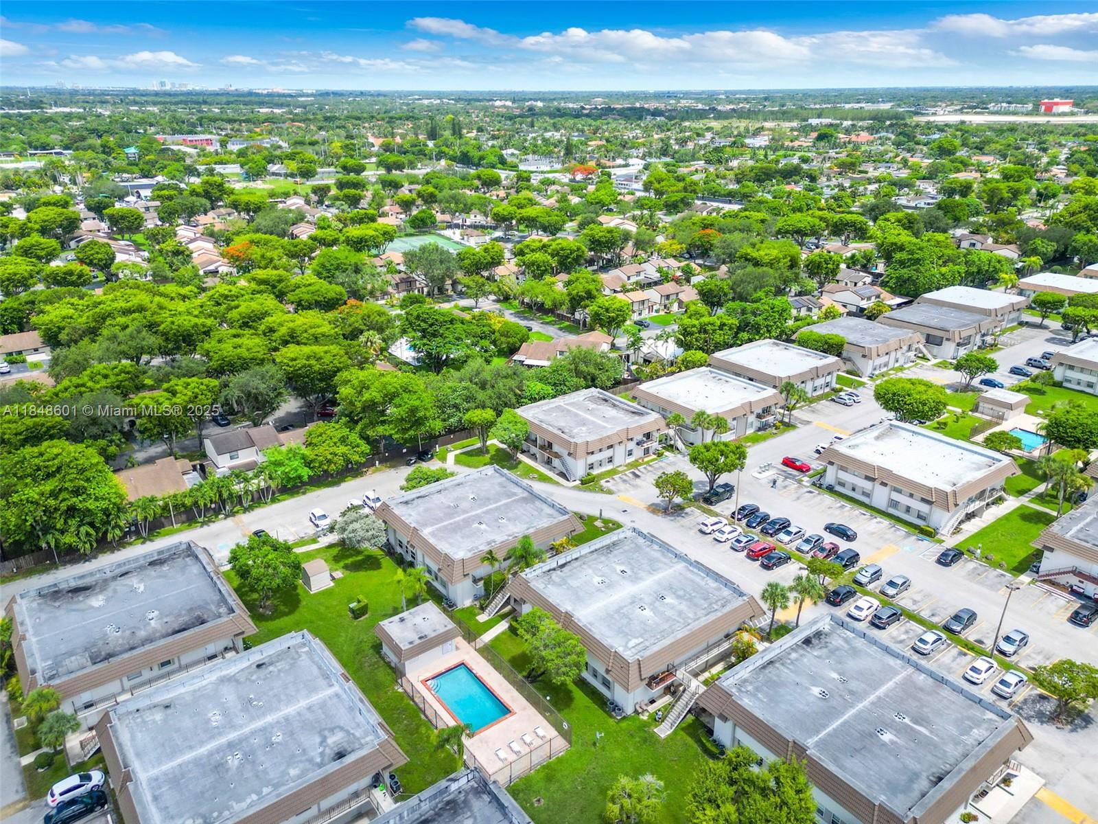 6911 Southwest 129th Avenue, Unit 2 Miami, FL 33183 - Photo 24 of 30 an aerial view of a city with lots of residential buildings