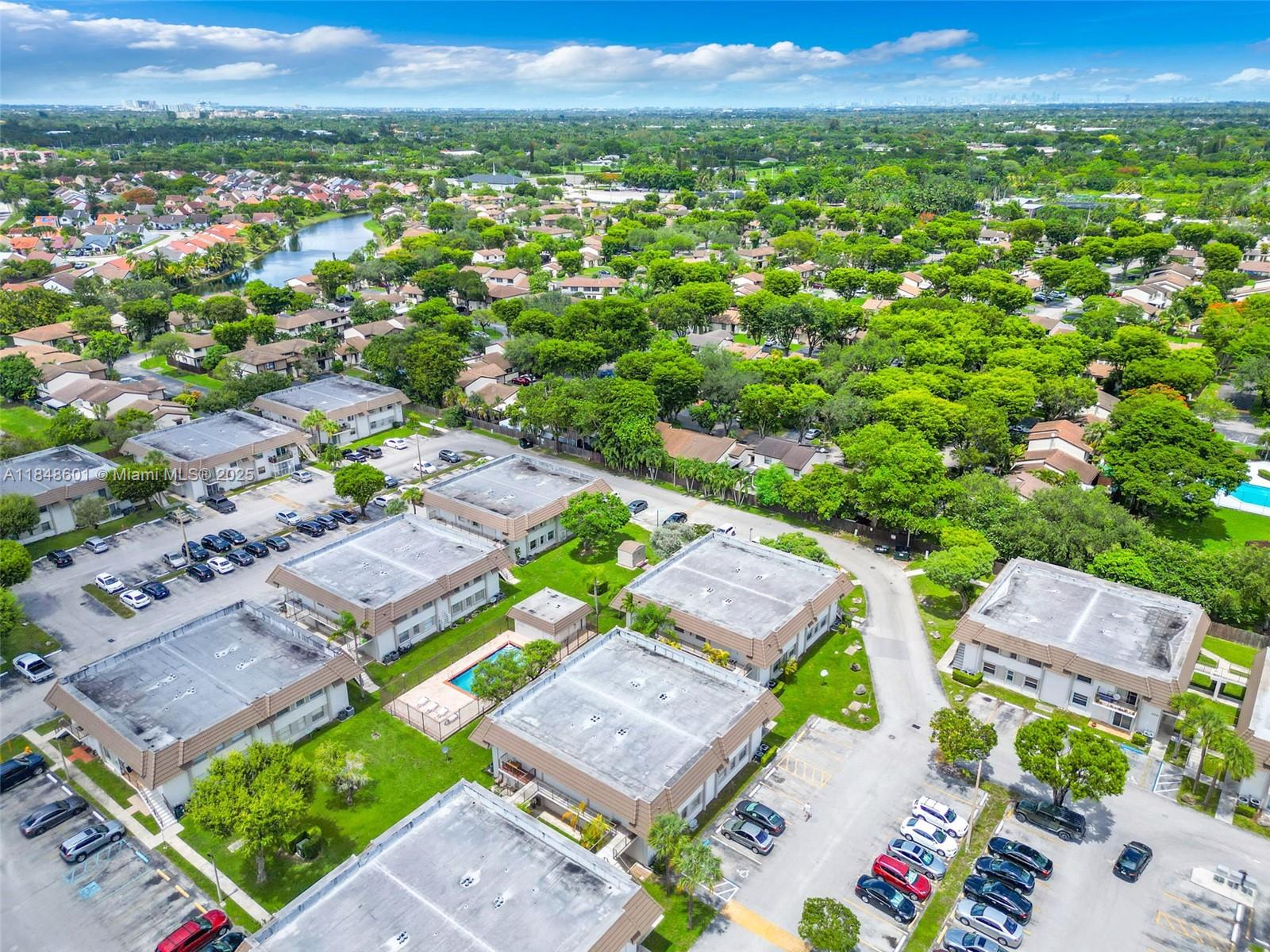 6911 Southwest 129th Avenue, Unit 2 Miami, FL 33183 - Photo 26 of 30 a view of a city with a mountain