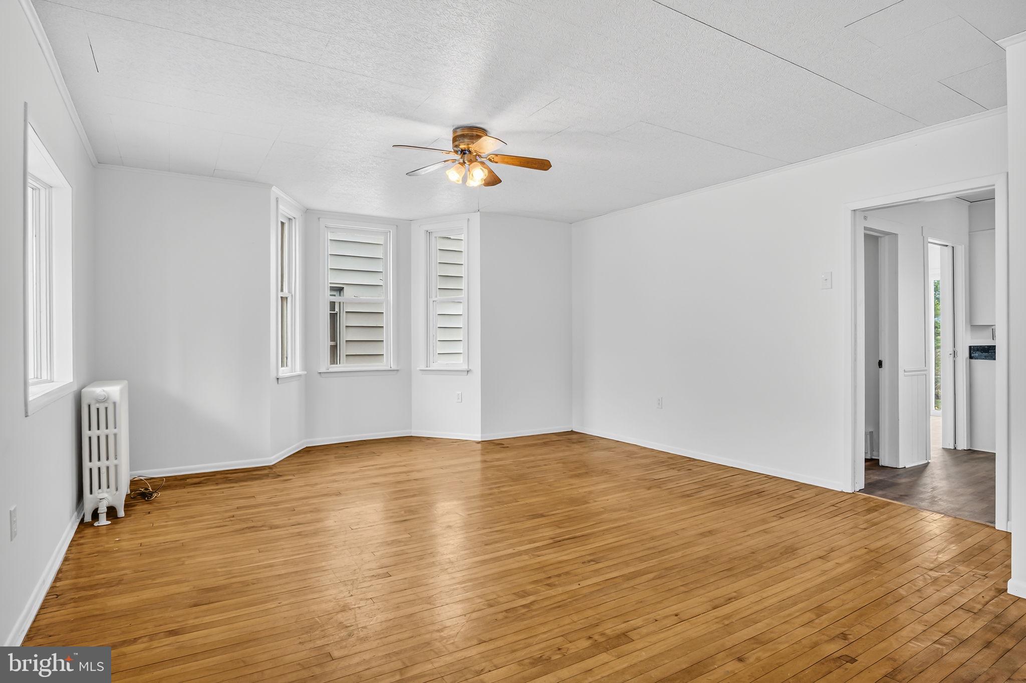 404 Main Street Lavelle, PA 17921 - Photo 5 of 33 Living Room / Dining (Hardwood Floors)