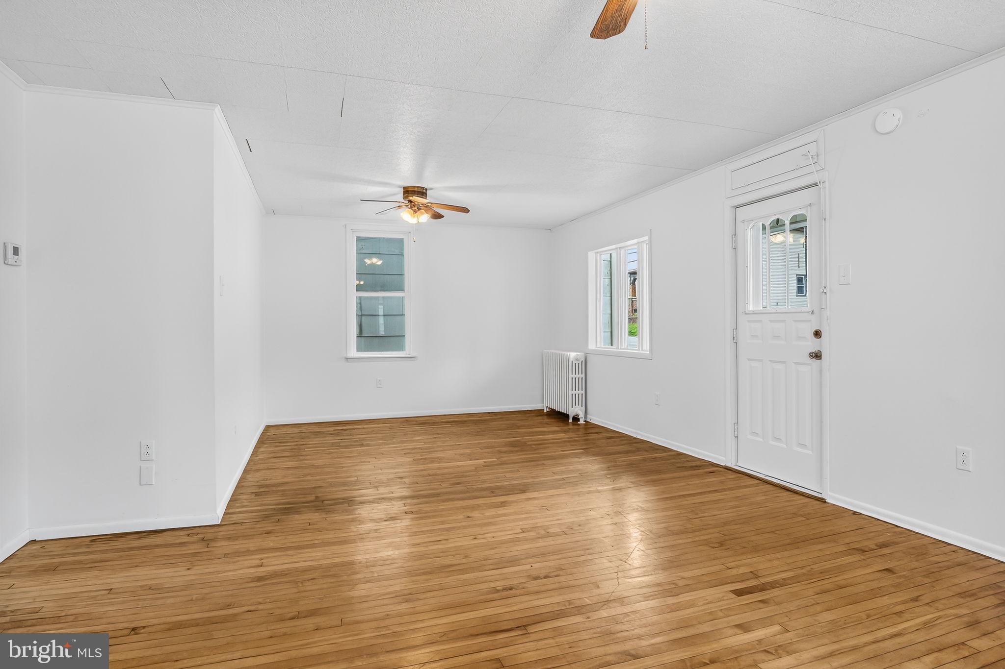 404 Main Street Lavelle, PA 17921 - Photo 6 of 33 Living Room/ Dining (Hardwood Floors)