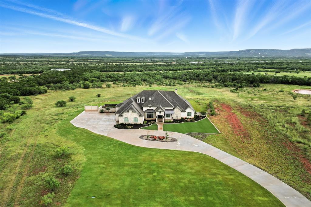 a view of a lake with a big yard
