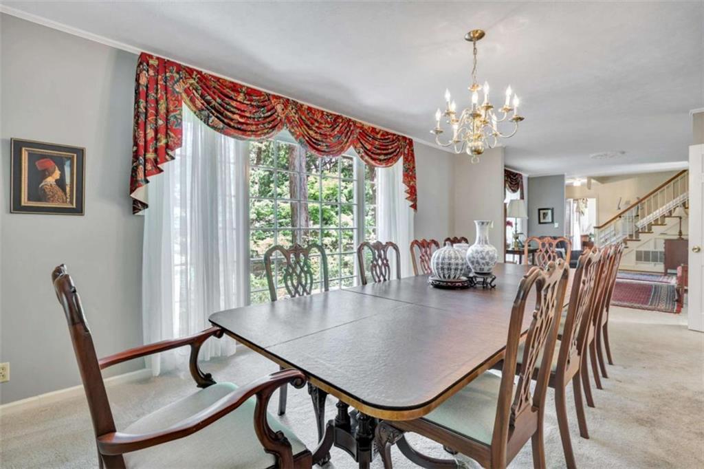 103 Gabriel Way Social Circle, GA 30025 - Photo 16 of 70 a view of a dining room with furniture window and outside view