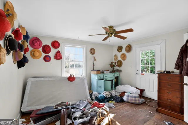 a view of a room with workspace and window