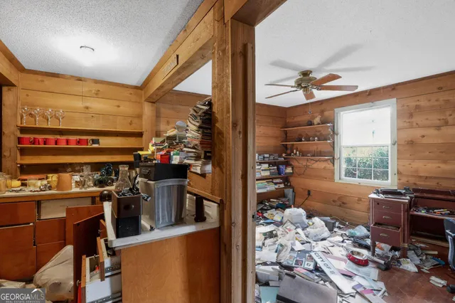 a kitchen with a stove and a sink
