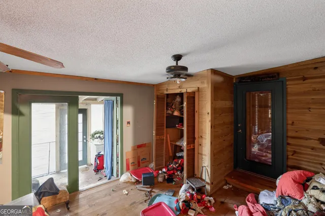 a view of kids room with large windows