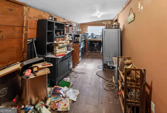 a room with furniture and a book shelf