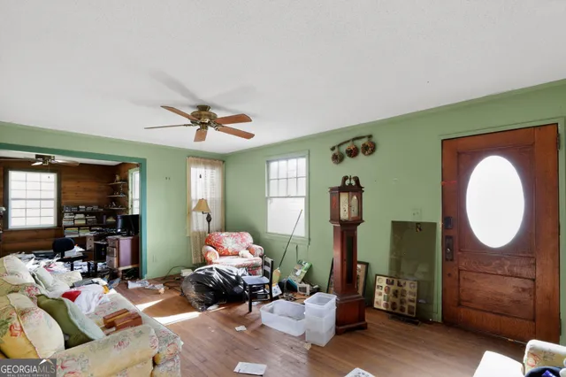 a living room with furniture and a window