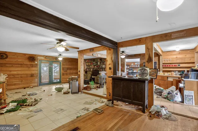 a view of a house with a yard and sitting area