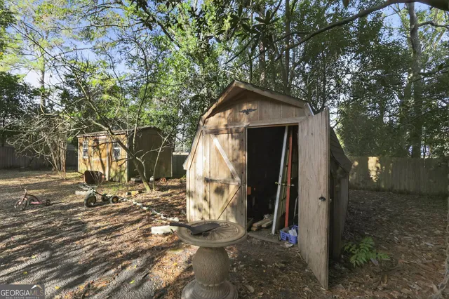 a room with lots of clutter and furniture