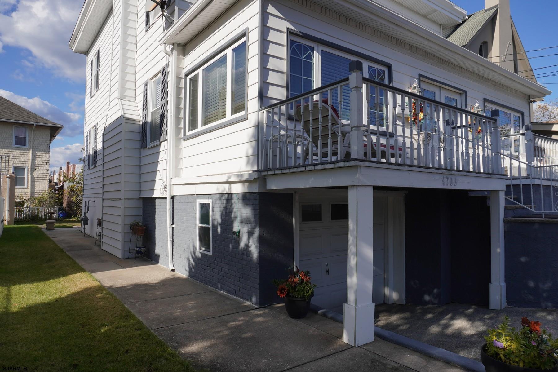 4703 Ventnor Avenue, Unit LOWER LEVEL Atlantic City, NJ 08401 - Photo 1 of 22 a view of a house with a door