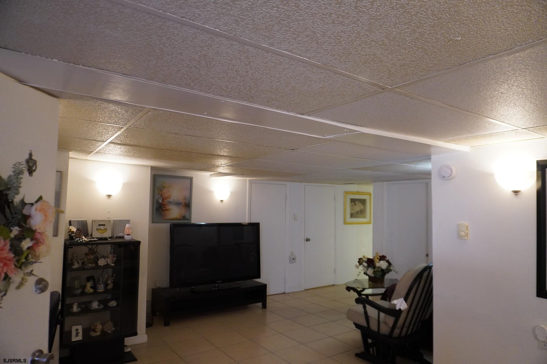 4703 Ventnor Avenue, Unit LOWER LEVEL Atlantic City, NJ 08401 - Photo 17 of 22 a view of a room with gym equipment