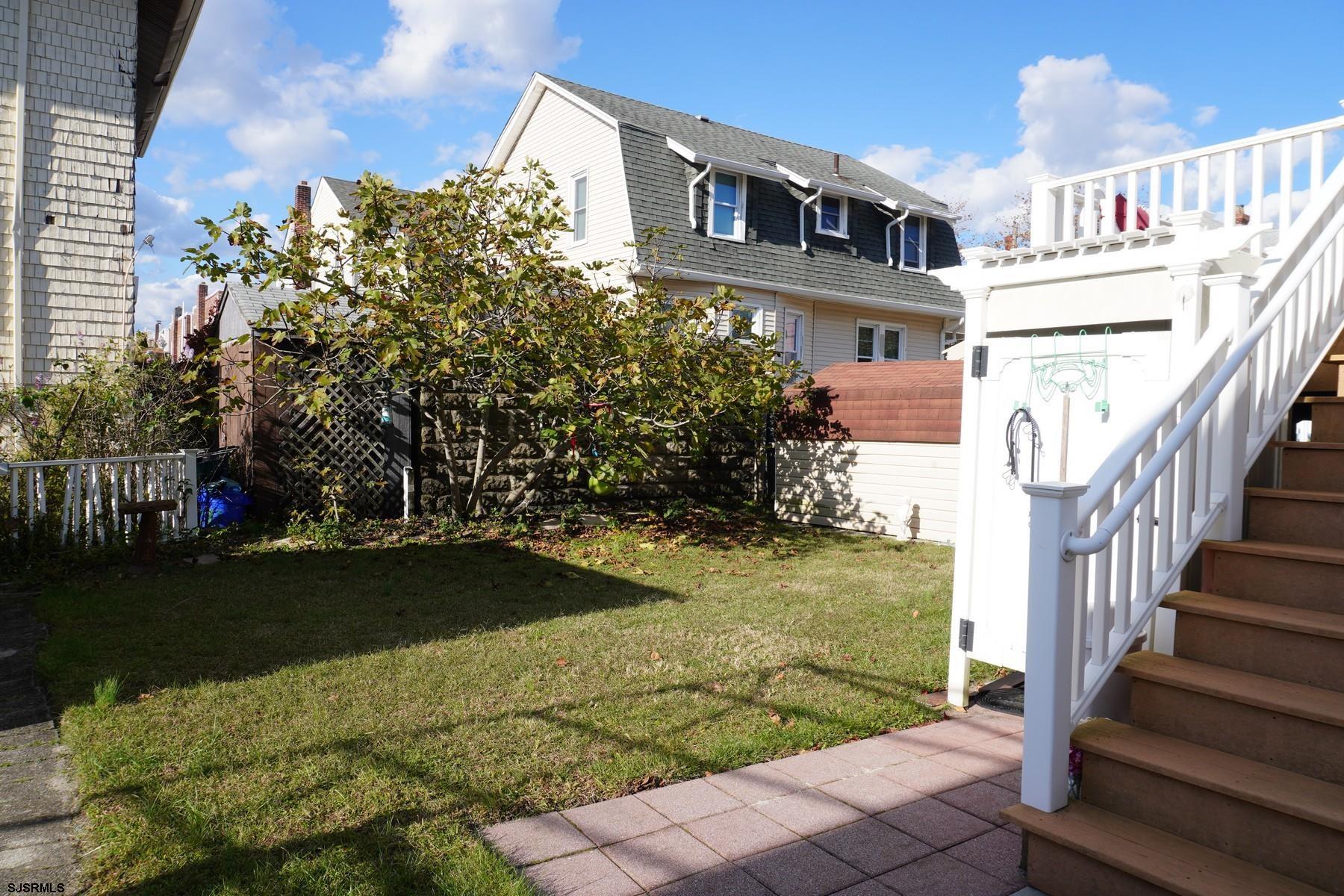 4703 Ventnor Avenue, Unit LOWER LEVEL Atlantic City, NJ 08401 - Photo 22 of 22 a front view of a house with garden