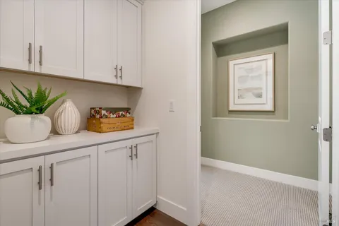 a kitchen with a sink a cabinets and window