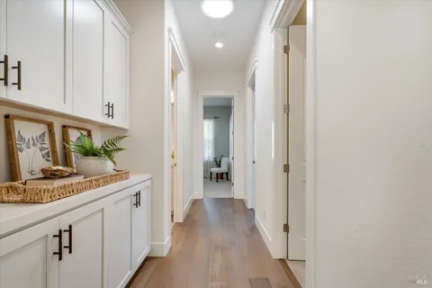 a view of a kitchen from the hallway