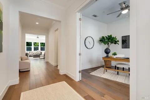 a living room with furniture and a table