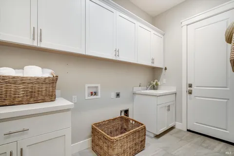 a room with cabinets and dust bin