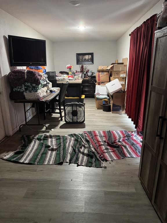 2023 Menefee Street Arlington, TX 76010 - Photo 14 of 14 a living room with furniture and a flat screen tv