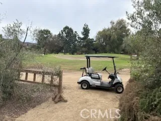 a car parked in the middle of a field