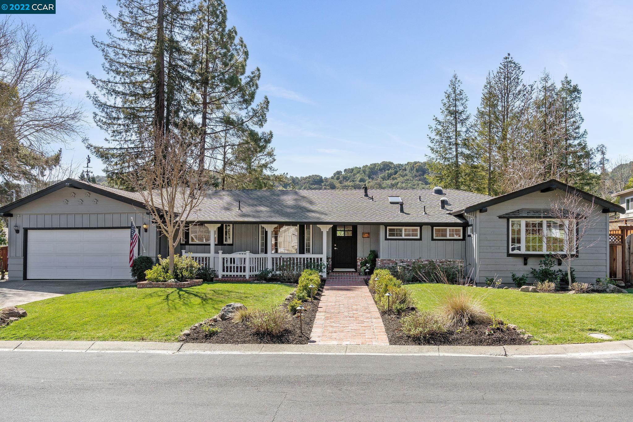 5 Corte Sombrita Orinda, CA 94563 - Photo 1 of 1 front view of house with a yard