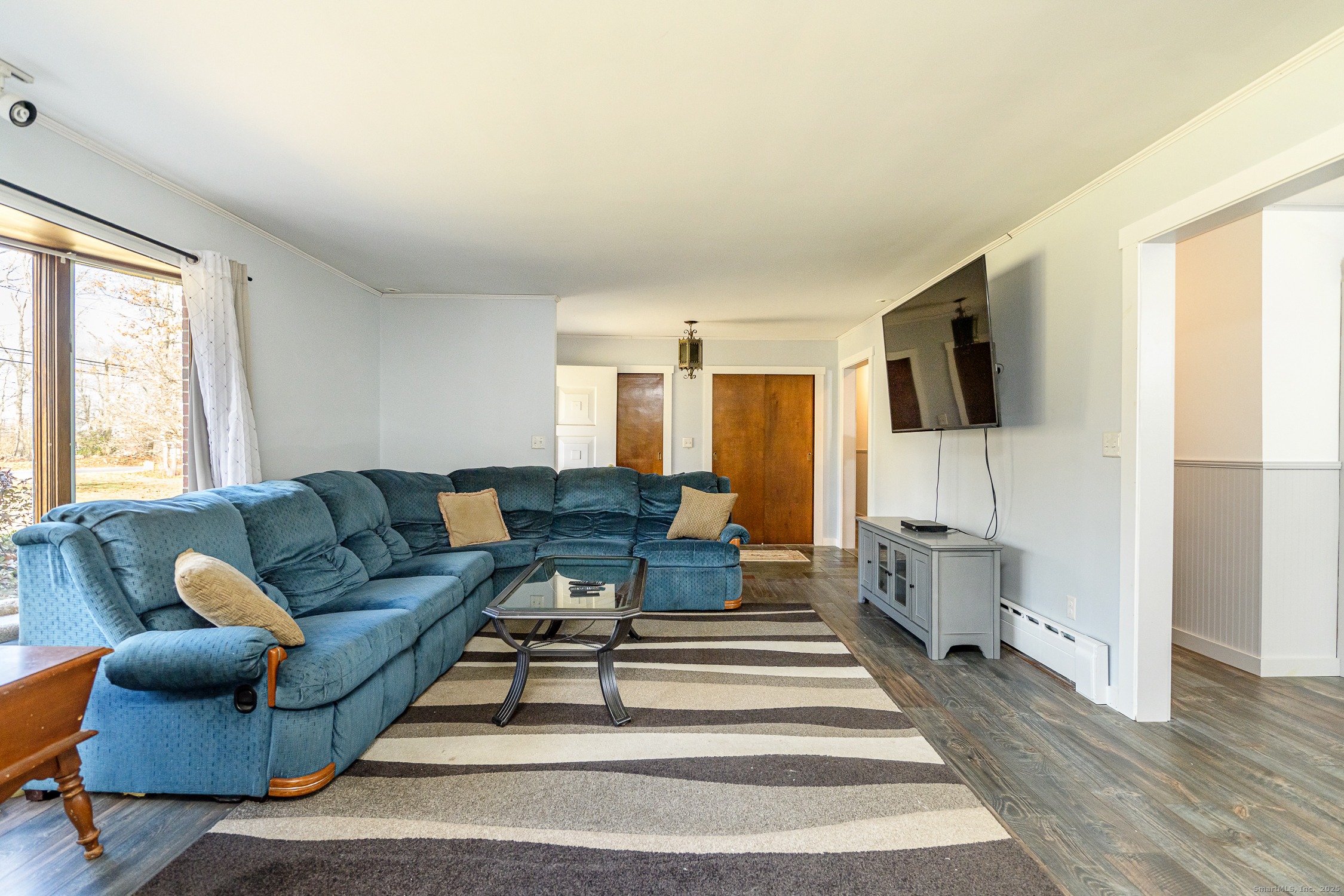 1436 North Road Killingly, CT 06241 - Photo 20 of 36 a living room with furniture and a flat screen tv